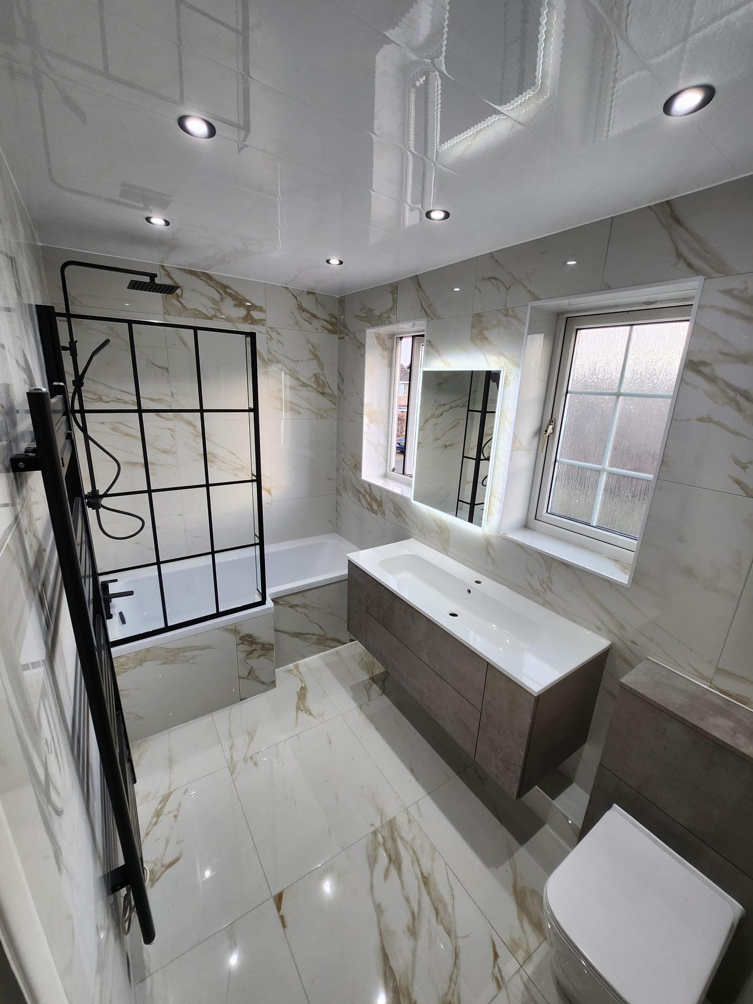 Beautiful Bathroom with white marble designer tiles